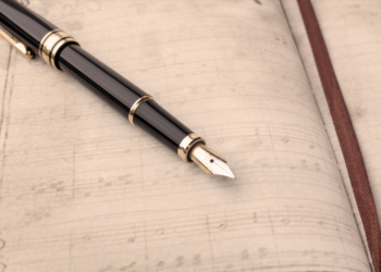 Fountain pen on music notebook