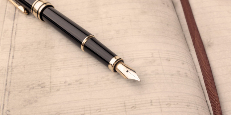 Fountain pen on music notebook